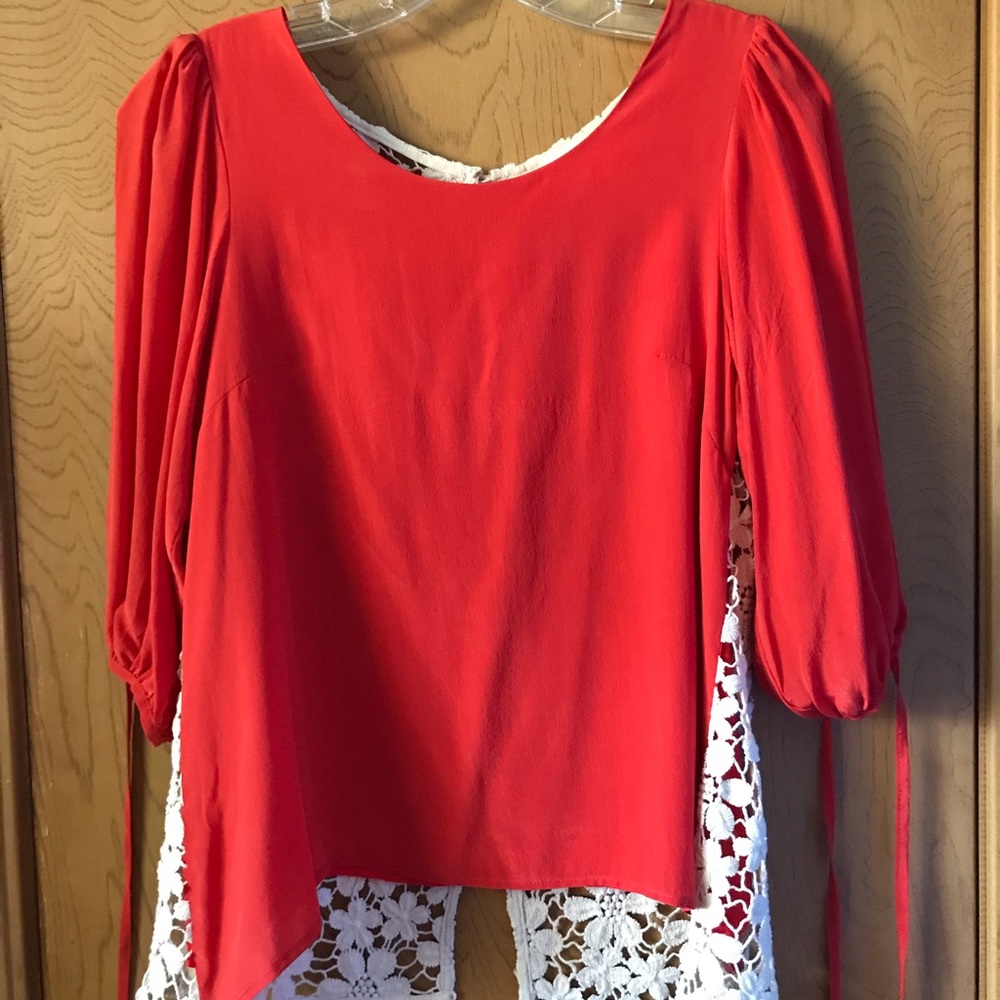 Anthropologie Orange red silk and crotchet blouse